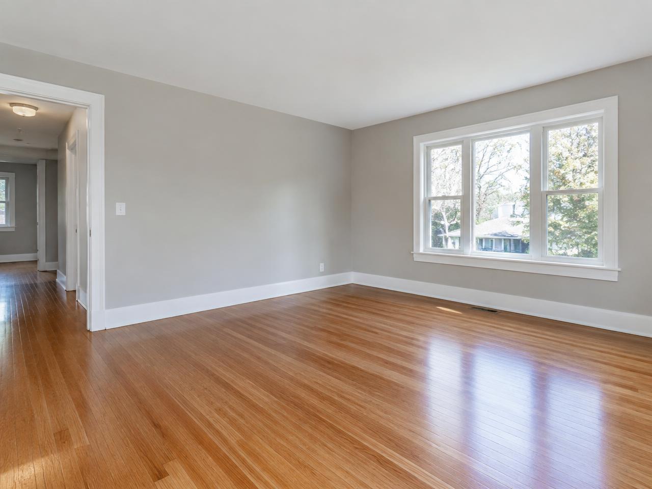 Freshly painted interior living room walls and white trim in a Morganton home